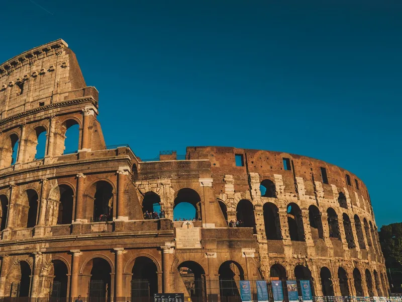 The Colosseum amphitheatre in Rome seen at golden hour