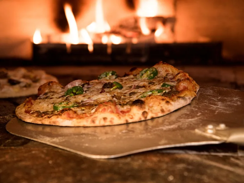 Thin crust Roman pizza at Pizzeria Formula Uno in San Lorenzo