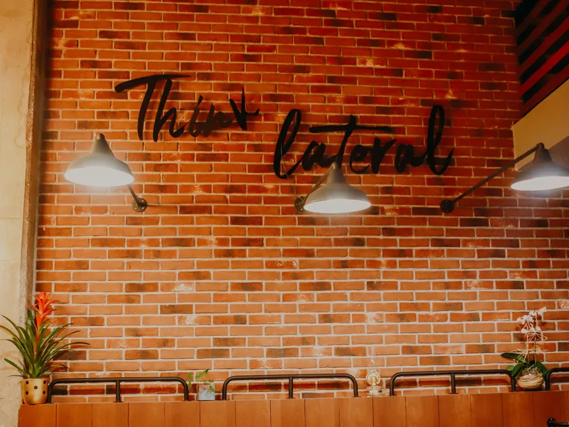 Industrial-chic dining hall at Porto Fluviale in the Ostiense district of Rome