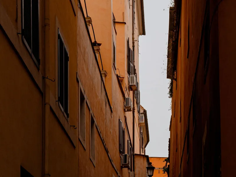 Narrow boutique-lined street in the Monti neighbourhood of Rome